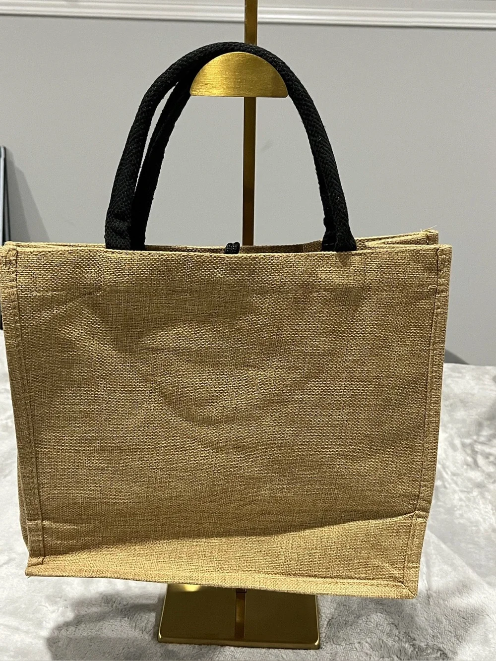beige burlap beach tote bag featuring 